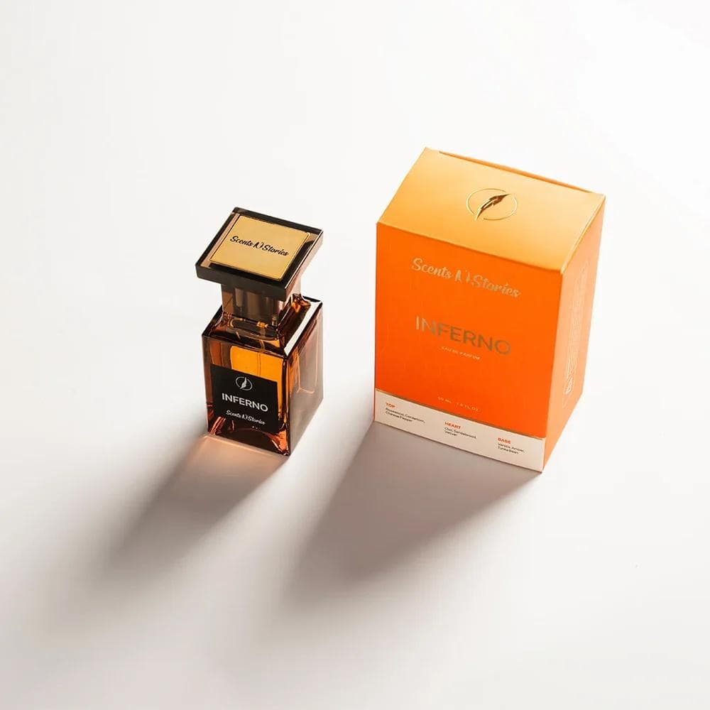 Scents N Stories Inferno perfume bottle beside its orange box